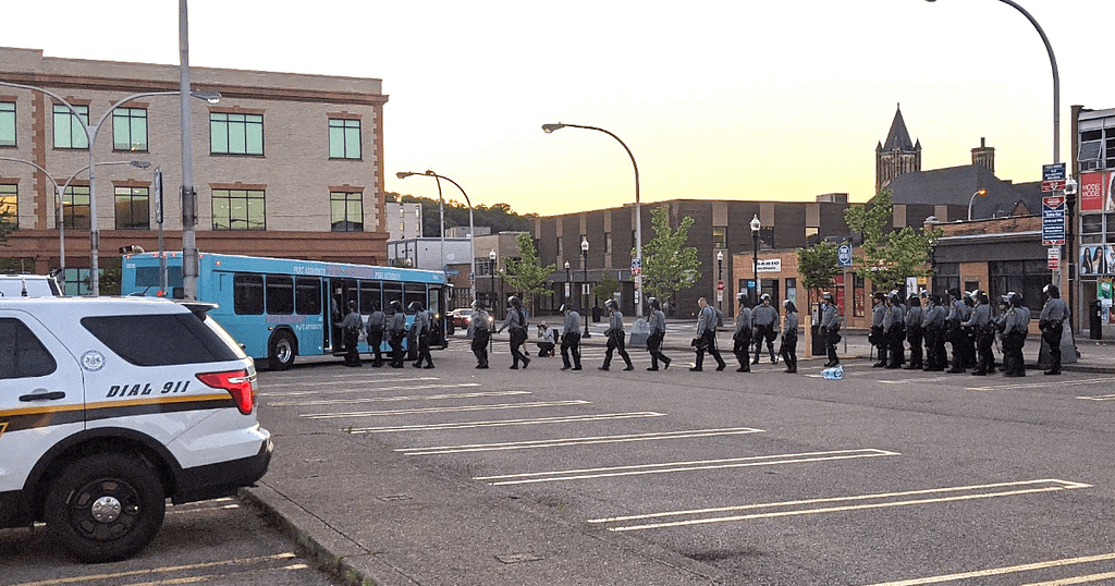 Photo of State Troopers boarding onto Port Authority bus in East Liberty, 5/31/20