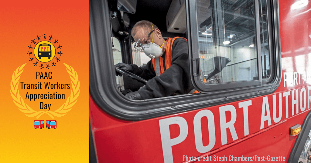 image description: A Port Authority Transit worker cleans the driver’s console of a red Port Authority Bus. Steph Chambers/Post Gazette Next to the image is a logo that says “PAAC Transit Workers Appreciation Day” with two golden ferns and two red emoji buses.