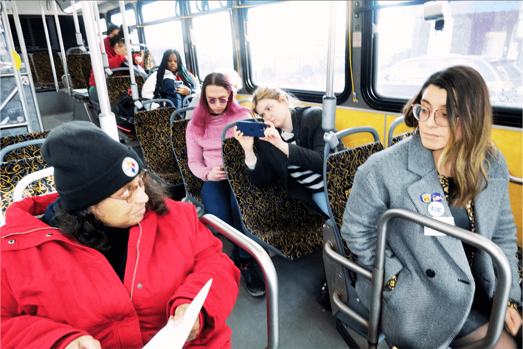 image description: Rep Sara Innamorato speaks to PPT Board Chair Verna Johnson during a March ’23 bus ride along on the 82 Lincoln